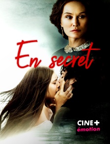 En secret